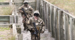 Soldiers wearing the latest prototype of the Integrated Visual Augmentation System (IVAS) during a trench clearing exercise