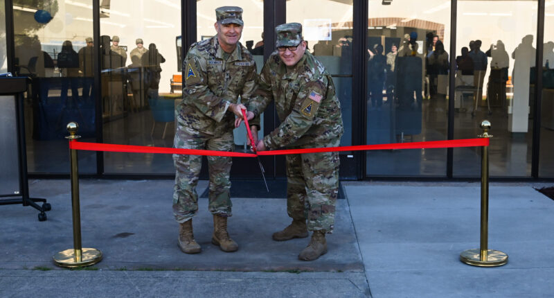 US Space Force leaders participate in a ribbon cutting ceremony for the opening of The Crucible Innovation Lab at Vandenberg Space Force Base, California