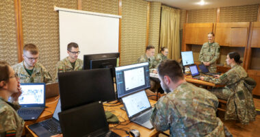 Lithuanian soldiers using computers during the Confidence 2024 exercise