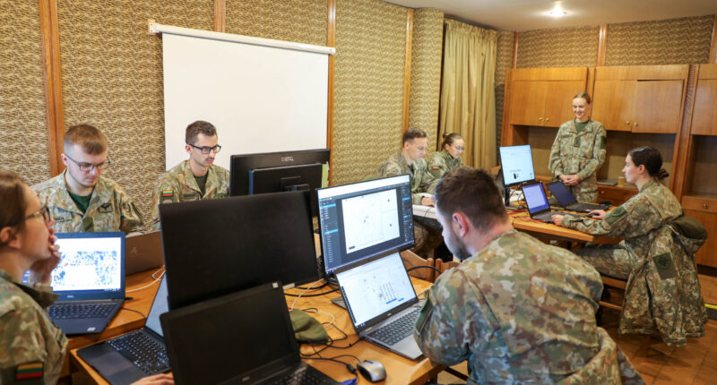 Lithuanian soldiers using computers during the Confidence 2024 exercise