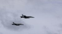 US Navy F/A-18E Super Hornets perform a fly-by