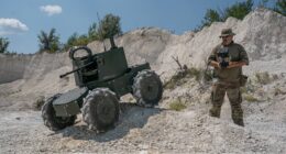 A Ukrainian soldier operates a Lyut 2.0 unmanned ground vehicle