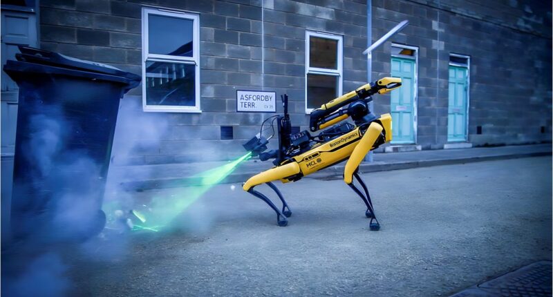 A four-legged robot participating in a bomb disposal demonstration facilitated by the UK Ministry of Defence